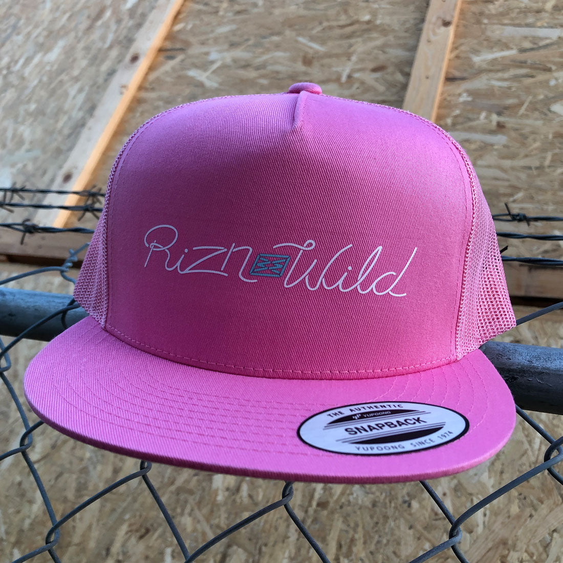 STREAM FLAT BILL TRUCKER HAT IN PINK